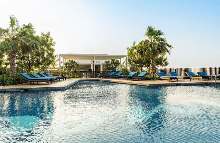 Pool and Beach Access with Food and Beverage for Two at Radisson Damac Hills | at Wondergifts