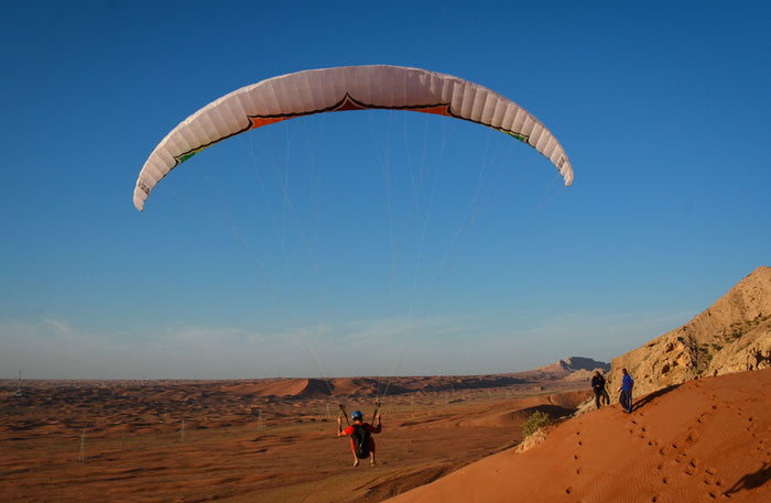 15-Minute Paragliding Flight Over Jebel Al Fayah Desert for One | at Wondergifts