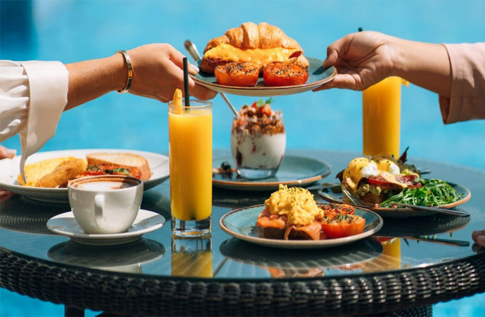 Vibrant Pool and Beach Day Pass with Dining and F&B Credits at Riva Beach Club