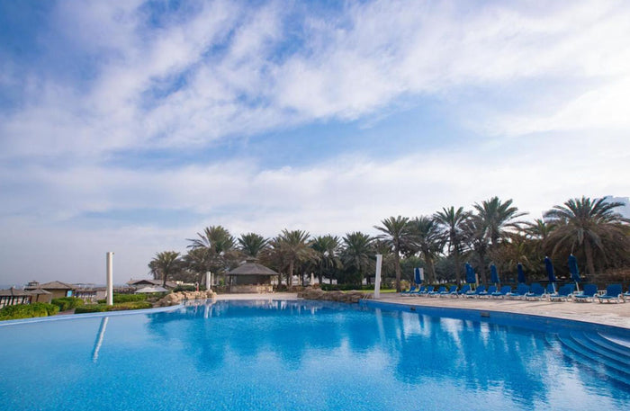 Elegant 1-Night Stay with Dinner and Breakfast at Coral Beach Resort Sharjah | at Wondergifts