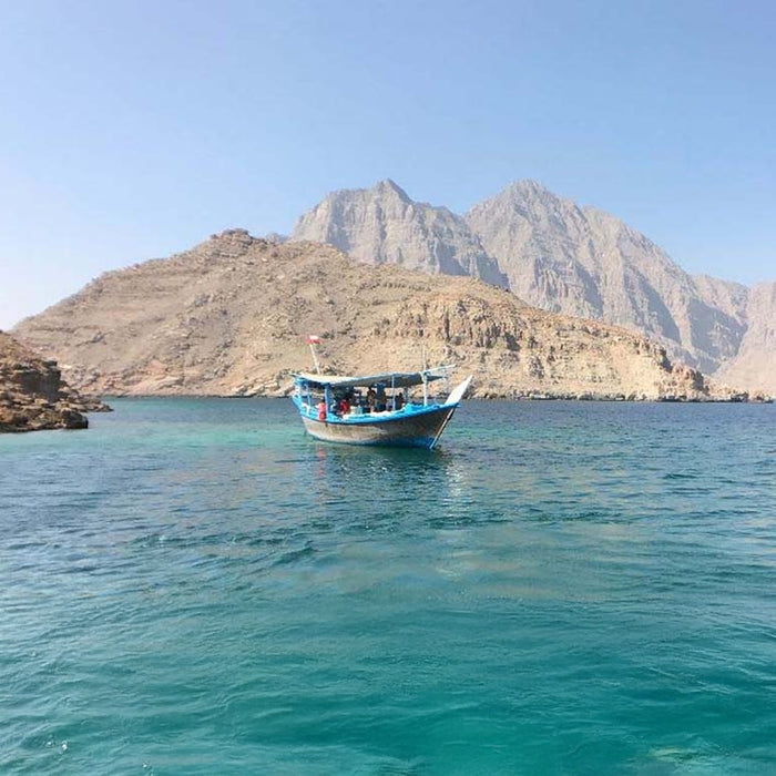 Private Overnight Musandam Dhow Cruise: Camping, Snorkeling & More for Three