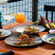 Hilton Skafos - Romantic 3-Course Dinner & Drinks for Two with Dubai Creek Views