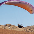 15-Minute Paragliding Flight Over Jebel Al Fayah Desert for One |  at Wondergifts