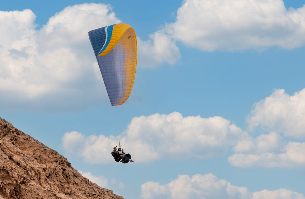 15-Minute Paragliding Flight Over Jebel Al Fayah Desert for One