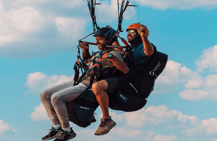 15-Minute Paragliding Flight Over Jebel Al Fayah Desert for One |  at Wondergifts