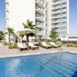 Pool and Beach Access with Food and Beverage for Two at Radisson Damac Hills |  at Wondergifts