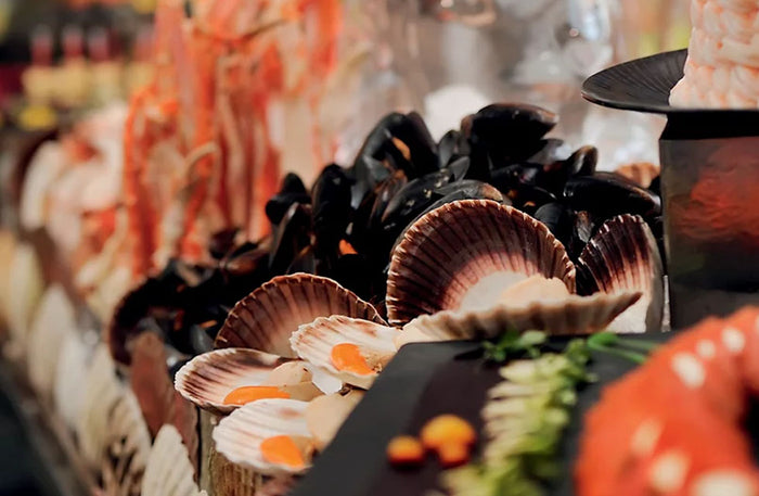 Opulent Sunday Brunch with Pool Access at Mövenpick Grand Al Bustan |  at Wondergifts