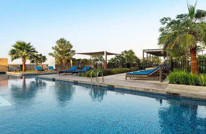 Pool and Beach Access with Food and Beverage for Two at Radisson Damac Hills |  at Wondergifts