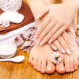 Elegant Classic Manicure & Pedicure at Spaces Salon - Valid at 2 Locations |  at Wondergifts
