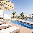 Pool and Beach Access with Food and Beverage for Two at Radisson Damac Hills |  at Wondergifts