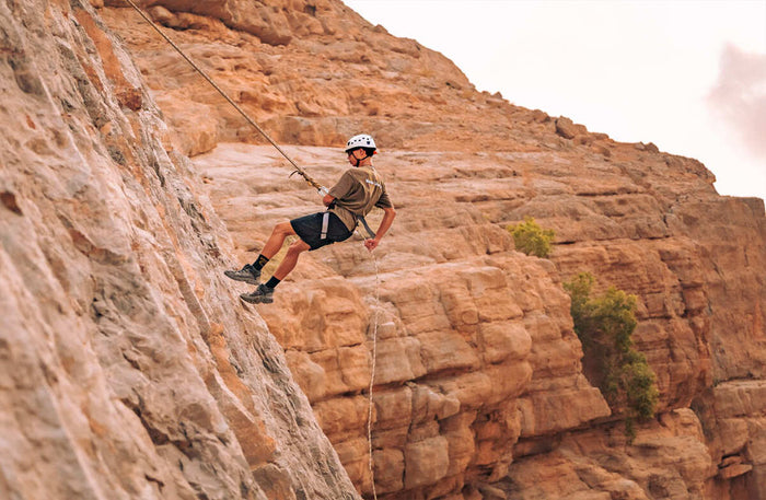 Abseiling or Rock Climbing Adventure for Two at Bear Grylls Explorers Camp