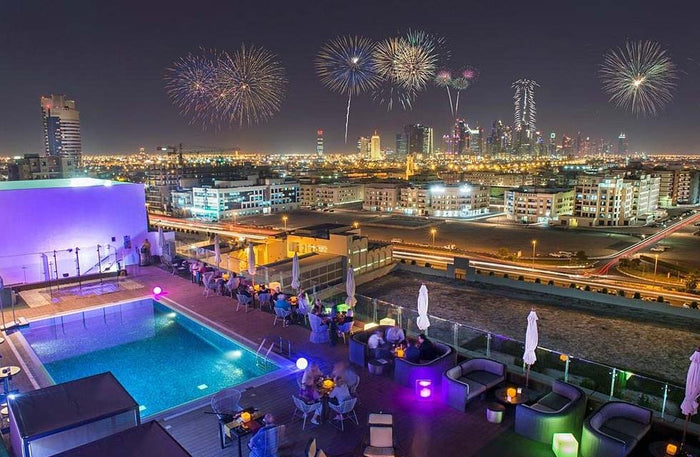 Sunset Dinner with House Drinks for Two at Estrellas Rooftop Lounge |  at Wondergifts