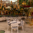 Cello Restaurant Dubai interior with elegant greenhouse-style glass garden