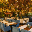 Cello Restaurant Dubai glass garden interior and dining tables