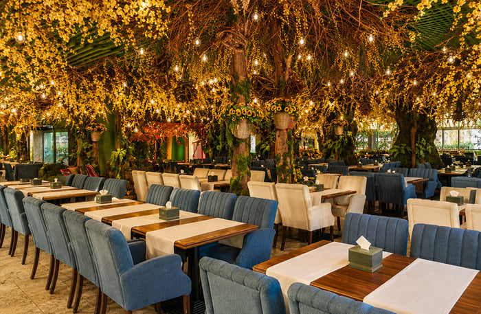 Cello Restaurant Dubai glass garden interior and dining tables