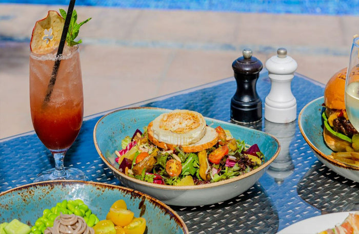 Vibrant Pool and Beach Day Pass with Dining and F&B Credits at Riva Beach Club