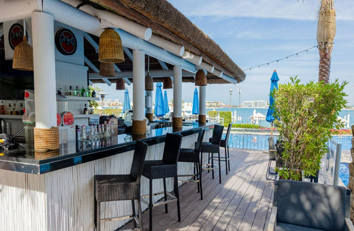 Vibrant Pool and Beach Day Pass with Dining and F&B Credits at Riva Beach Club