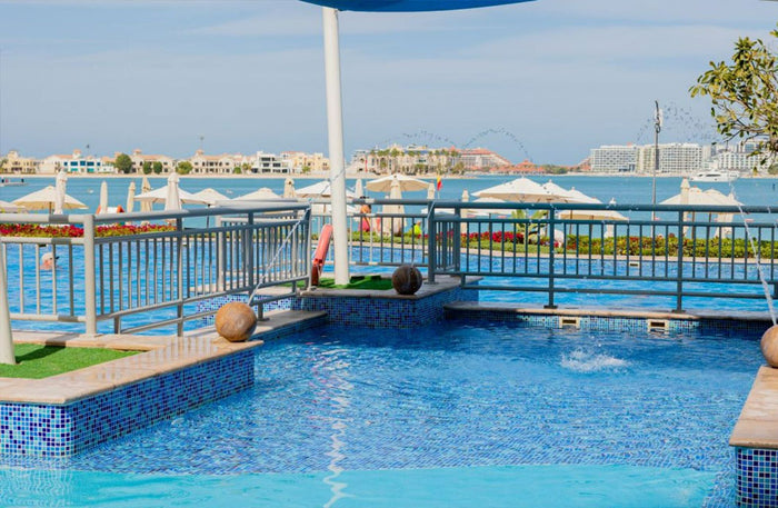 Vibrant Pool and Beach Day Pass with Dining and F&B Credits at Riva Beach Club