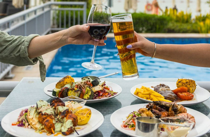 Vibrant Pool and Beach Day Pass with Dining and F&B Credits at Riva Beach Club